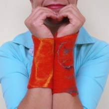 felted wrist warmers -to hide a little thought-
