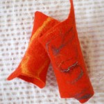 felted wrist warmers -to hide a little thought-